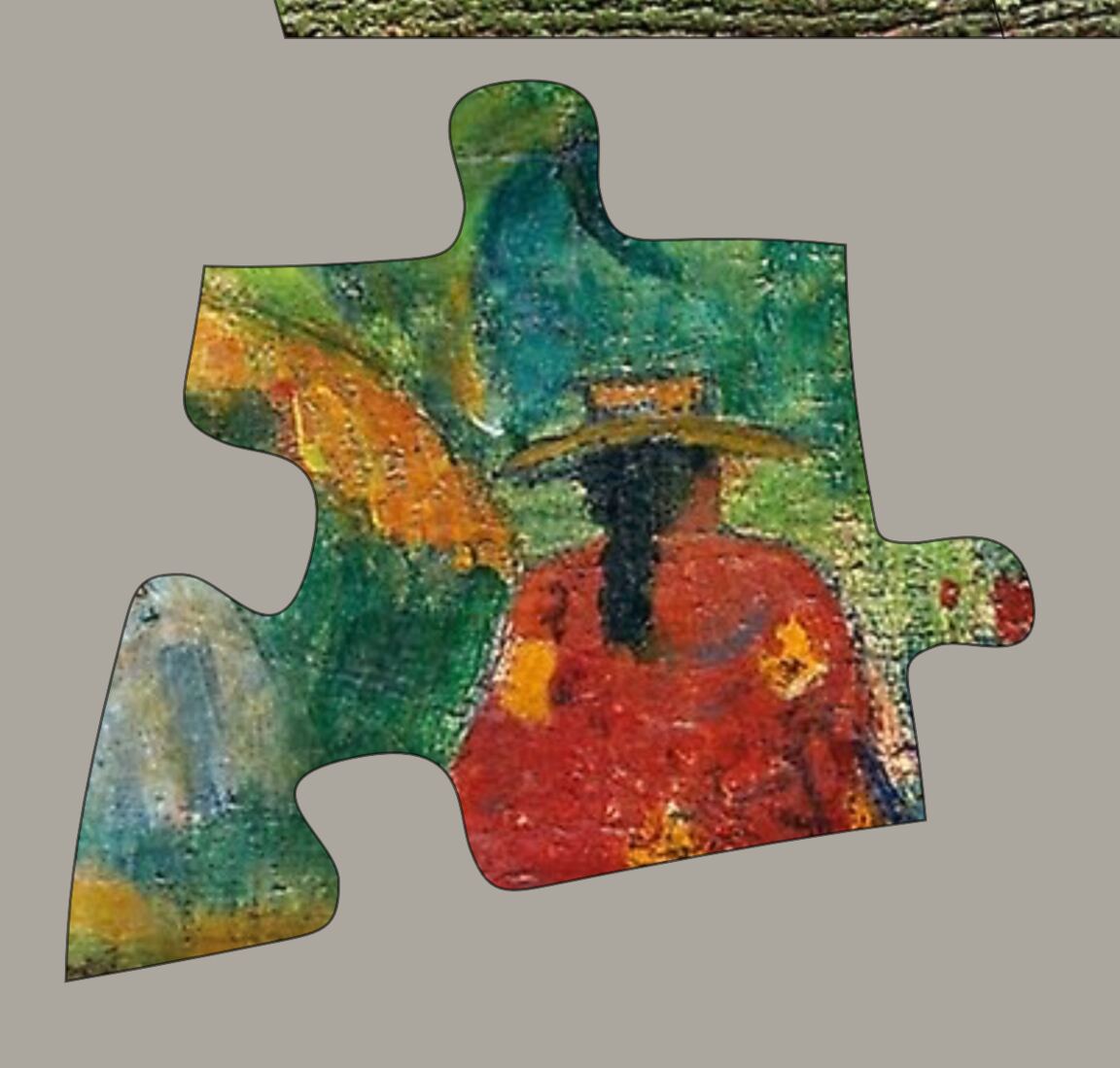 A single piece close up, its edges shaded so it reads as raised off the table.